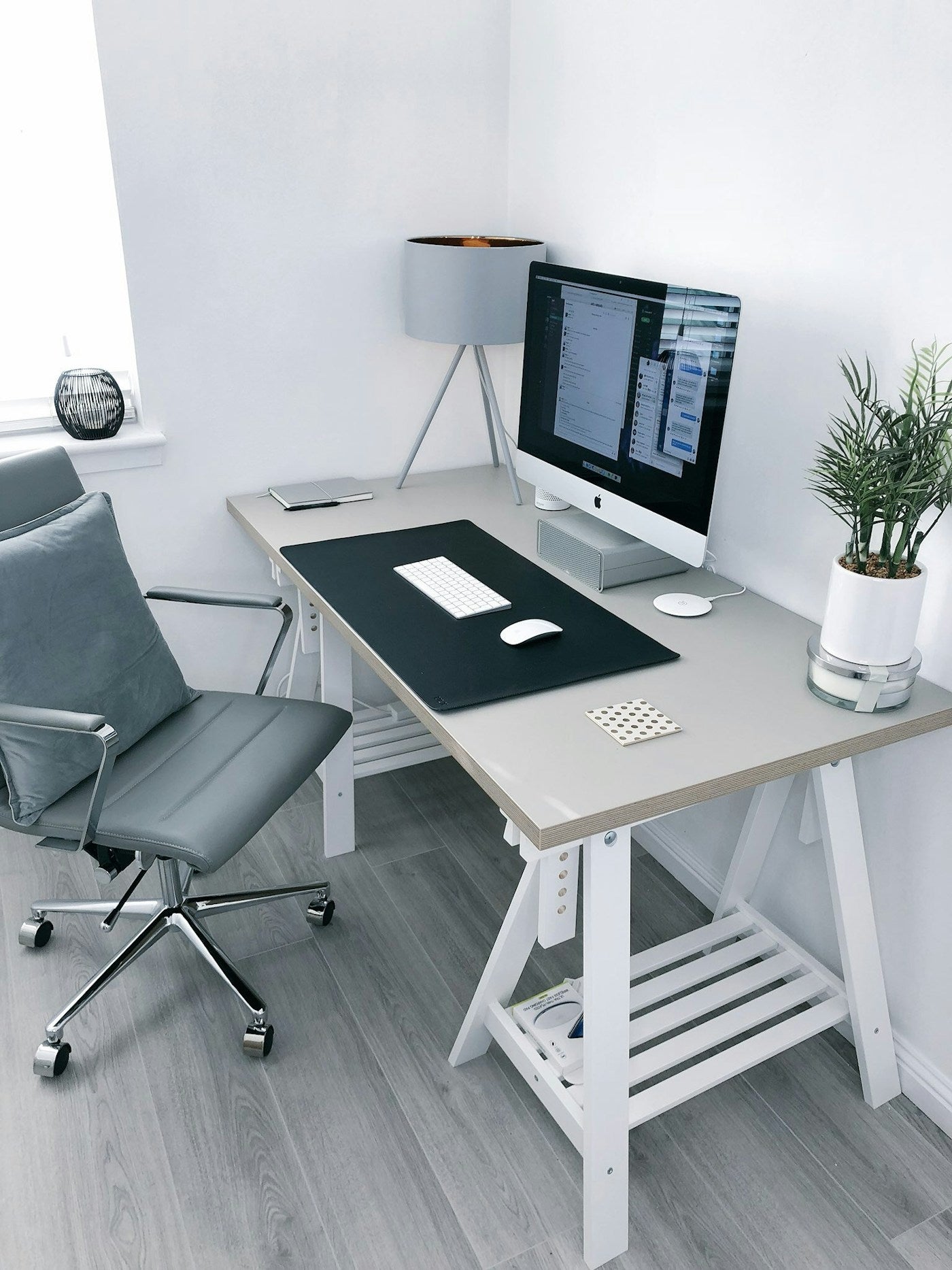 Organized under-desk storage and cable management setup
